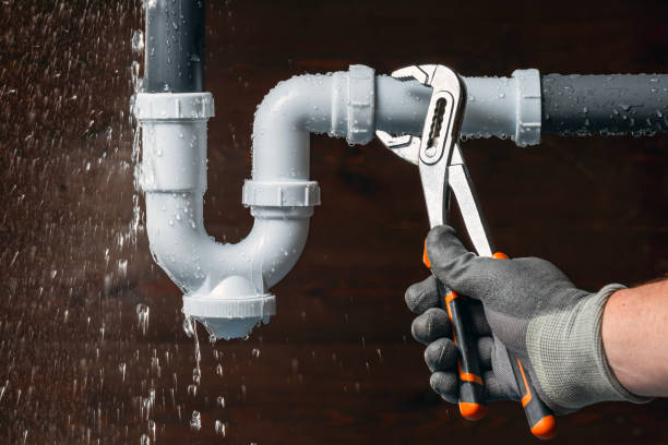 Professional Emergency Plumber technician working in Glen Oaks, NY